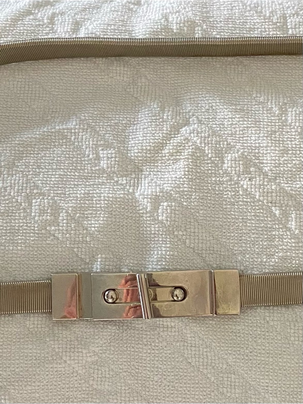Gold-Tone Slim Metal Belt with Push-Lock Clasp stretches from 26”to 38”